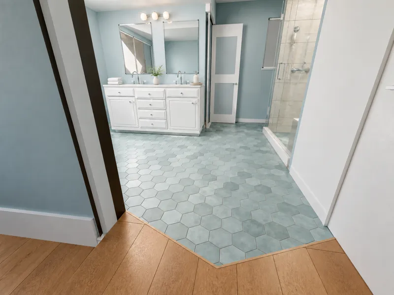 Bettina bathroom with blue walls, white vanity and hexagon floor tile