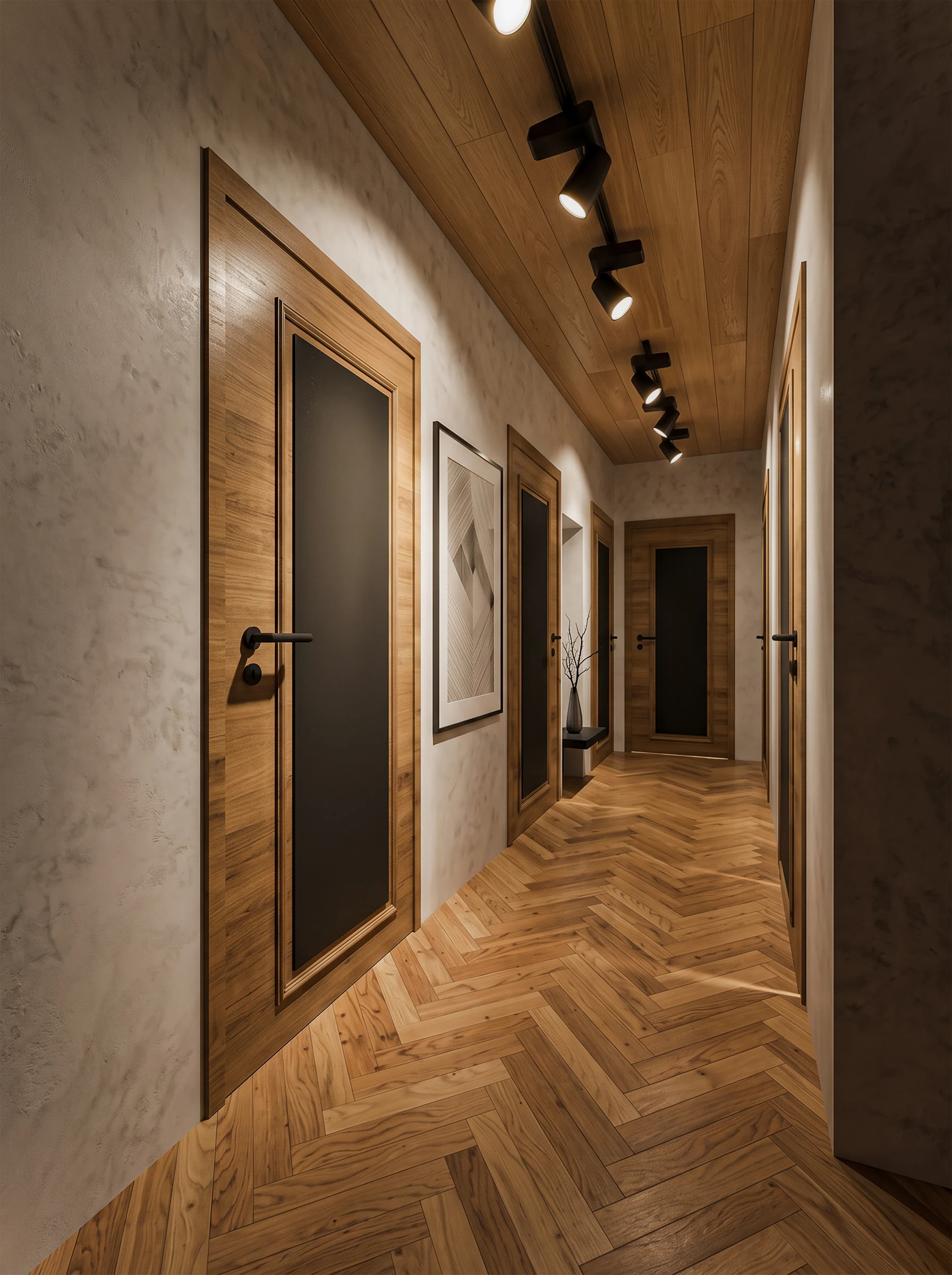 Warm timber hallway with herringbone flooring, framed art and ceiling spotlights